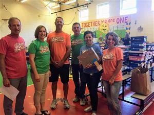 Jennifer Berquist was in the trenches stuffing backpacks with school supplies. 